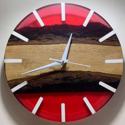 Epoxy clocks with a live edge, the best way to add nature's effect on your wall.
size: 12 inch dia

Price: 2,700/-