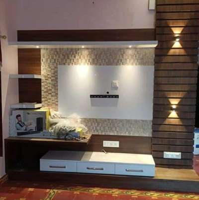 #LivingRoomTVCabinet 
 #skinterior 
We are the manufacturer of Rich Quality FACTORY MADE Modular Kitchen, Wardrobes, TV Panels, Bar Units, Study Tables, Sofa etc.

We do all manufacturing at our own / in-house factory at Noida sector-141 and we serve in entire Delhi / NCR region. For more details please drop contact number or you can call 9650483503.