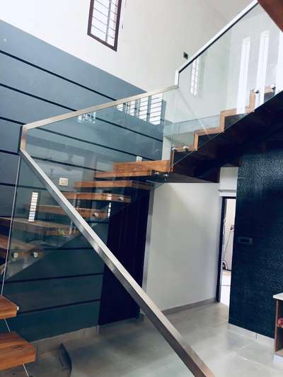 Frameless glass handrail works 9400296552
www.swastikhomeinteriors.com