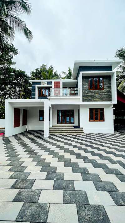 1712/3bhk/Contemporary style
/double storey/kasaragod

Project Name: 3bhk,Contemporary style house 
Storey: double
Total Area: 1712
Bed Room: 3bhk
Elevation Style: Contemporary
Location: kasaragod
Completed Year: 

Cost: 39 lakh
Plot Size: