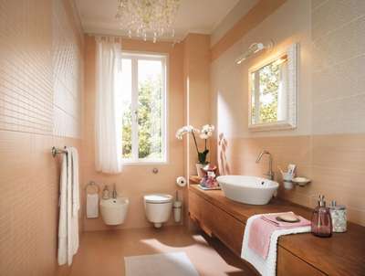 How gorgeous is this bathroom we designed for our client? It has a minimalist aesthetic, a double sink, and a large mirror. #bathroomstyle #interiordesign #interiors #bathroominterior #bathtub #luxuryinteriors #largemirror