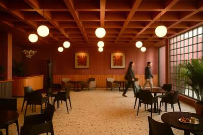 "Caffe Arancia, awash in burnt orange hues, is a living canvas - where every shade whispers warmth, every shadow holds a pause, and the air hums with the poetry of stillness and slow conversation".