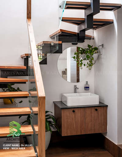 Minimal, modern, and efficient the Wash Area of Bhodhi 
perfectly complements the home’s warm wooden tones and open design. 🌿💧 
Designed for Dr. Ullas & Dr. Nimmi in Palakkad. 
Completed in 2024