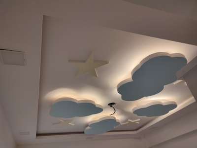 Kids room
#tyagiconstructions 
#FalseCeiling #KidsRoom #kidsroomdesign #kidsbedroom #Clouds #stars #1800sqftHouse #covelights #warm #HomeAutomation #ElevationHome #HomeDecor #HomeDecor #homesweethome #homeinterior