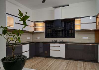 #ModularKitchen #LShapeKitchen #marineplywood #mica #KitchenIdeas #keralainteriordesign #trending #koloviral #koloamaterials