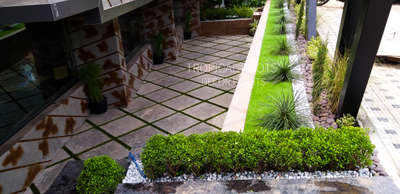 landscaping by tropical roots #location-Ramees restaurant,Wyte fort hotel, Maradu, Kochi