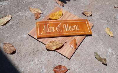 Engraved Name Boards on Wood.. 
contact : Nandhanam Industries, Pandalam
9544509733