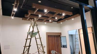 who to design the ceiling with wooden material & 
light