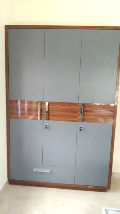 #threedoor wardrobe
Marine plywood