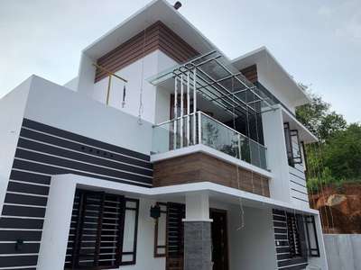 1732/3bhk/Modern style
/double storey/Thrissur

Project Name: 3bhk,Modern style house 
Storey: double
Total Area: 1732
Bed Room: 3bhk
Elevation Style: Modern
Location: Thrissur
Completed Year: 

Cost: 35 lakh
Plot Size: