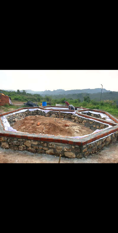An octagonal shaped cottage under construction
In this construction we used,
Natural stone for foundation
old demolishing bricks for bricks work
provided mud plastering
provided filler slab type concrete
provided brickbat flooring
 #lowcostarchitecture 
 #lowenergybuildings
 #economical 
 #naturefriendly