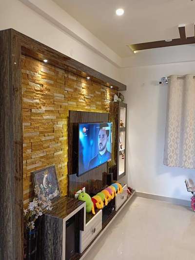 #Tv unit
Designer interior
9744285839