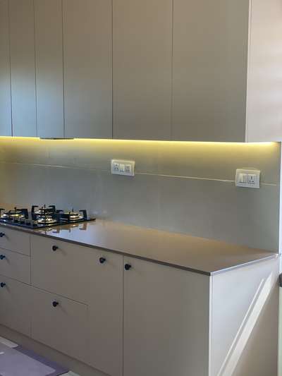 cozy and nuetral 
studio flat
Modular kitchen - tv console - Bedroom #keralainterior #KeralaStyleHouse #keralaarchitectures #interiordesignkerala