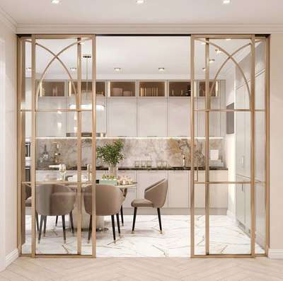 sliding door in  matt gold pvd coated,
 #SlidingDoors #moderndesign  #gates  #furnituremaker #DiningTableAndChairs #LivingroomDesigns