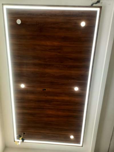 #wooden celling  #CelingLights  #vineer  #micalaminates  #Thrissur