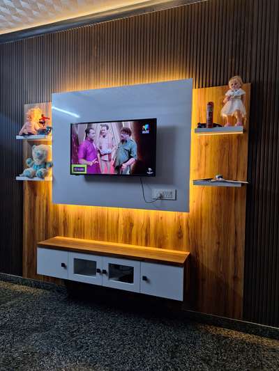 TV Unit with pvc paneling

#interior #home #IndoorPlants #tvinterior #modularTvunits #tvunitstorage #pvcpanneling #storage #LivingroomDesigns