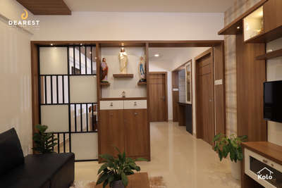 Client Name: Mr. Prajith Francis
Area:  1000 Sq.ft
Budget: 8 Lakh
Location: Kakkanad


Seamless harmony of spaces! Our partitioned hall with a dedicated prayer unit is a testament to unity in design. From divinity to modernity, every corner tells a story. #InteriorHarmony #PrayerSpace #ModernDesign #HomeInspiration #KoloApp #DearestInteriors