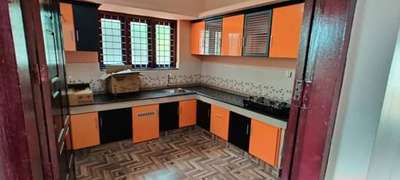 modular kitchen orange black combination