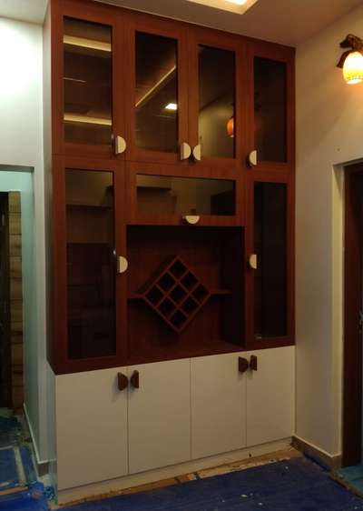 crockery shelf

Plywood :Trojan classic BWP 710 grade 25 year warranty...

Fittings : hettich soft close

Lamination : 1mm century laminate for door ,.8 white Matt laminate inside

Handle: customized 
 
8mm Star multywood used for back panel


 #Thrissur