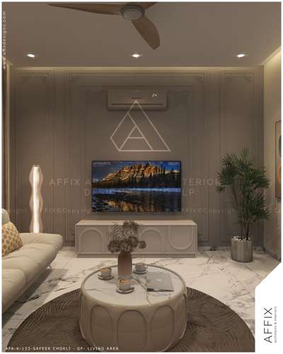 "The living area blends semi-classical elegance with a modern, welcoming atmosphere. Anchored by a plush, L-shaped puff sofa, the space offers both comfort and sophistication. The sofa is positioned to invite conversation while framing the room's focal point — a stunning feature wall adorned with vertical reaper design panels, adding texture and visual interest" #architecturedesigns  #Architectural&Interior  #Architectural&nterior  #kerala_architecture  #LiviRoomTVCabinet  #guestlivingroom