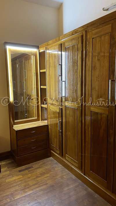 Wooden wardrobe with mirror
customised 
contact +91 95393 29269
#furnitures #Kollam #Almirah #almirahdesign #woodenAlmirah #InteriorDesigner #BedroomDecor #mirrorunit #storageshelf #storagecabinat #storageshelf