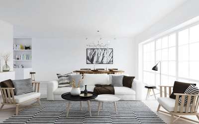 Create this Scandinavian style living room which features a muted color palette complimented with rich textures added to sofas, rugs and pillows. Use Black and white striped cushions and rugs, B&W coffee table set, and a clean white sofa to get this look. #interior #decor #ideas #home #interiordesign #indian #colourful #decorshopping