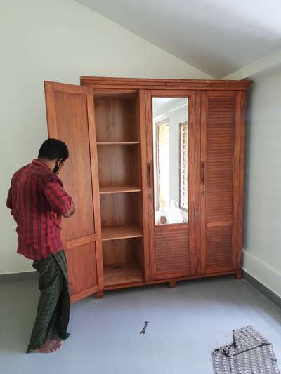 treated mahagony wardrob  with wooden handle cost about 40000