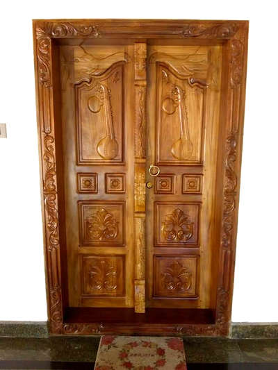 double door with veena carving