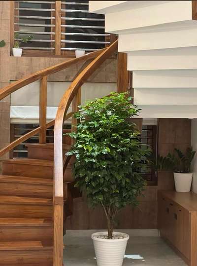 Premium Wooden Staircase  
 Staircase  #InteriorDesigner  #interior  #dreamhouse  #Architect  #Kozhikode  #calicut  #Edonbuilders