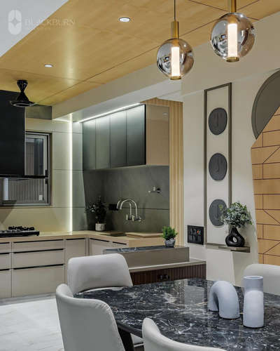 Creating sanctuaries of style, blending modern chic with classic allure to redefine luxury living in every meticulously curated detail. #KitchenIdeas  #KitCabinet  #LShapeKitchen