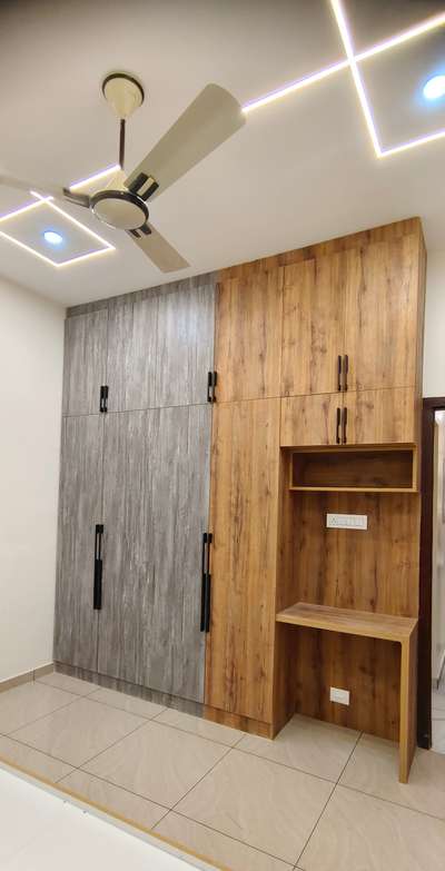 #Wardrobe #Stairwork #woodenstair  #Kollam #interior #keralastyle  #keralahomedesignz  #WardrobeIdeas  #4DoorWardrobe