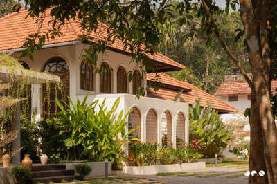 Arcade – Where arches, light, and landscape converse, and tradition finds a quiet 
contemporary soul.
Clients : @aarcha_vinod @ramvinodk 
Area: 4488 Sq.ft
Location: Bharanikavu, Kollam, Kerala.
Principal Architect/Designers: @ar.jun_v_a @_ar_anoop @ananthansurendran 
Interior Styling: Adheena Baburaj @dhii_design_studio 
Photography: @iksha.in #TraditionalHouse  #architecturedesigns  #interiordesign #kerala_architecture