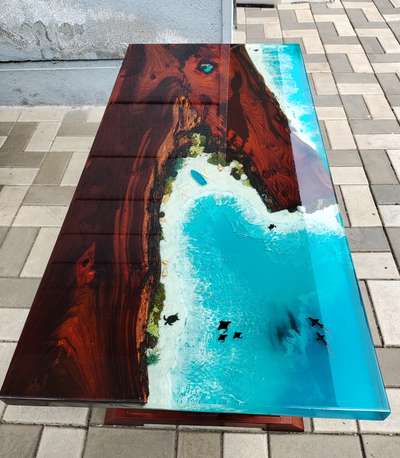 4x2 feet beach themed teapoy table made with Indian Rosewood and finished in full gloss. DM us to order. 90743 56676 #resin  #resintable  #epoxy  #epoxyresintable  #epoxycoating  #epoxydining  #epoxyfurniture  #Homedecore  #epoxytablekerala  #clocks  #InteriorDesigner  #epoxytables  #resintable  #resinart  #teakwood  #TeakWoodDoors  #Teapoys  #CoffeeTable  #teak_wood  #teakwoodchair  #eastindiawalnut  #ocean  #oceandecor