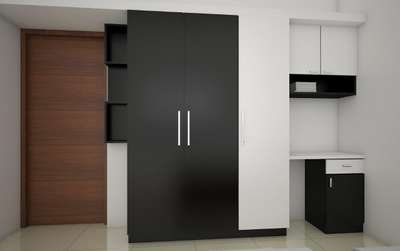 wardrobes design by carnival Interiors @ Nettoor, Cochin