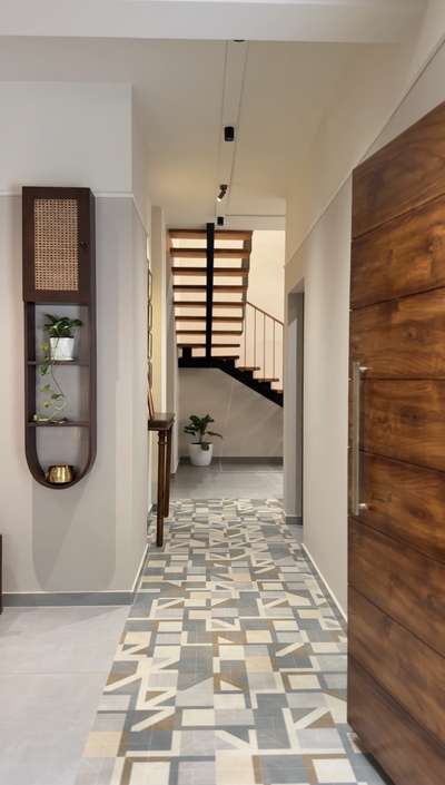 A hallway shouldn’t just be a path; it should be a preview of the home's character. ✨
.
.
Project : Bijiraj villa
Location : Arimbur
Construction : Reliable Builders 
.
.

 #HouseConstruction  #Residentialprojects  #commercialprojects  #Buildingconstruction  #CivilEngineer  #Contractor  #constructioncompany  #buildersinthrissur  #Designs  #projectmanagement  #buildersinkerala  #buildingdrawings  #turnkeyProjects  #InteriorDesigner  #Architectural&Interior  #structural  #renovations  #qualityconstruction  #workmanship  #buildersinkerala  #buildersinthrissur  #buildingpermits #dreamhome