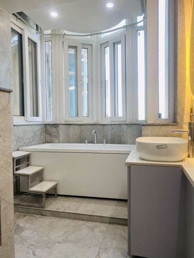 Bathroom makeover 🌸❤️
Divy Interiors 
.
.
.
.
.
 #BathroomDesigns  #bathtub  #LUXURY_INTERIOR  #interiordesigner  #bathroominteriors  #BathroomTIles  #walltilesdesign  #vanitydesigns  #mirrorunit  #Architectural&Interior  #archintactdesign #interiorforyou #apartmentdesign  #apartmentinteriordesign
