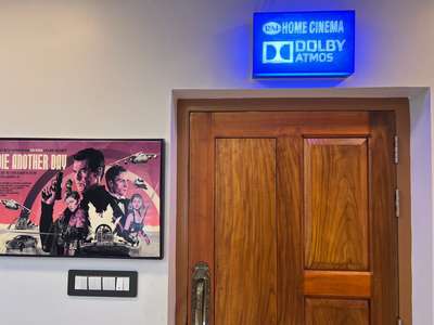 The home cinema is designed with state-of-the-art audiovisual technology, providing an immersive viewing experience. Comfortable, plush seating and optimized acoustics ensure that every movie or show is enjoyed to the fullest. #architecturedesigns  #Architectural&Interior  #InteriorDesigner  #KeralaStyleHouse #ContemporaryHouse #HouseDesigns