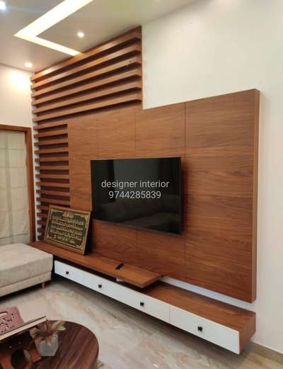 #Tv unit
Designer interior
9744285839