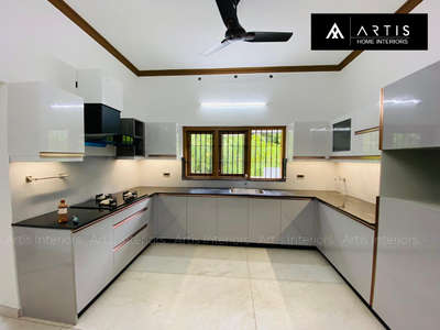 Client Mr. Joseph 
Puthupally 
Kottayam 

Kitchen  #InteriorDesigner  #Kitchenrnterior  #KitchenRenovation  #HouseDesigns  #KitchenDesigns  #tandembox  #baskets  #gtpt  #glossykitchen