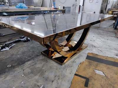 dinig table steel with PVD rose gold finish