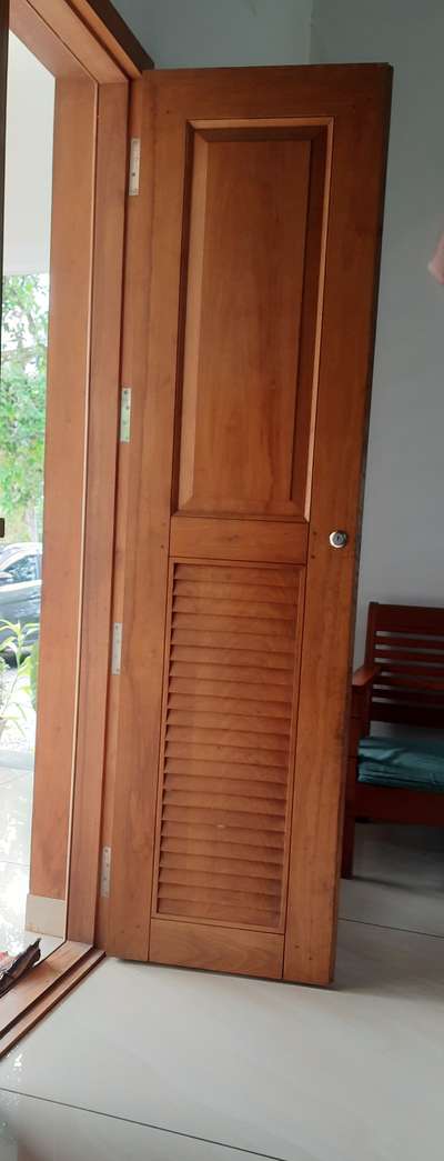 wooden double door with teakwood