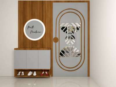 flat main entrance design with shoes storage