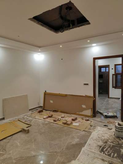 Follow us on our journey of creating a 110 sq yards house that is a work of art. From laying the foundation to adding the finishing touches, we will share every step of the process with you. Swipe to see the amazing transformation of this space. #newproject #realestate #workofart #Interior Designer #Architectural&Interior #LUXURY_INTERIOR #False Ceiling #MasterBedroom #LivingroomDesigns #LivingRoomTV #lobbydesign #Kitchenideas #KitchenRenovation