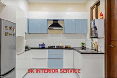 U Shaped Blue And White Glossy Kitchen

Kitchen: U-shaped white and blue glossy kitchen
 #ushapekitchen  #ModularKitchen  #KitchenIdeas