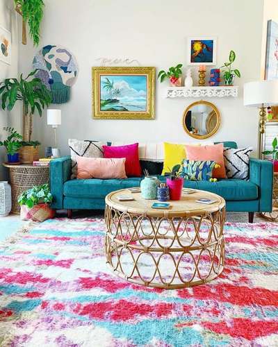 The current home decor trends are for vibrant colors, lots of art and pattern. Decorate your room with a wood framed round mirror, multicolour cushions, rainbow carpet, and rattan tables.
#interior #decor #ideas #home #interiordesign #indian #colourful #decorshopping