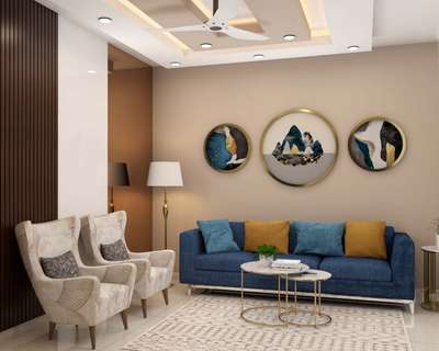 This contemporary style living room gives a simple and comfortable vibe with the 3-seater blue sofa, cushions in both warm and cool colours, round marble coffee table and a floor lamp with brass stand. The round picture frame with sand brown paint, adds depth to the room. #interior #decor #ideas #home #interiordesign #indian #colourful #decorshopping