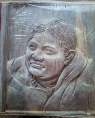 amma  in  teak wood