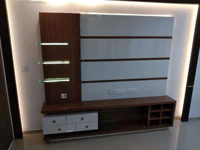 Dark Wooden & White Colour Combination LCD Unit With Led Light Looks Ambitious. 

Contact For More Details:-9958220900
 #LivingroomDesigns 
 #LivingRoomTVCabinet 
 #LivingRoomTV 
 #Modularfurniture 
 #modularwardrobe 
 #ModularKitchen 
 #HomeDecor