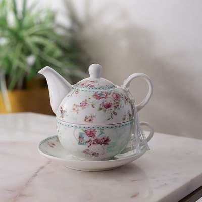 Savour your tea time with our designer ceramic kettle teacup and saucer set. It's more than a collection; it's a cherished ritual. The kettle brews perfection, filling your space with inviting aromas. Paired with its teacup, each sip is pure indulgence.

#avintageaffair #vintagedecor #teakettle #teaset #teacups #homedecor #kitchendecor #teatime #tearitual #kitchenessentials #tealovers #interiorstyling #teamagic #homeaccents #kitchendesign #sipinstyle #teamoments #interiordecor #homeaesthetics #homedecorfinds #homestyling #decoratingtips #tableware #tabledecorations #newarrivals #giftideas #floralpattern #sleekdesign #showpieces #shopnow #decorshopping