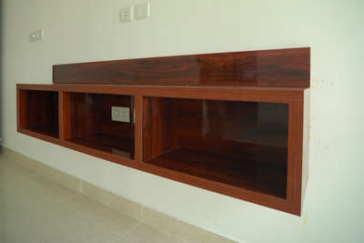For minimalist lovers, Silent Valley Interiors offers TV units with some of the simplest designs. Contact them at 9446444810."
